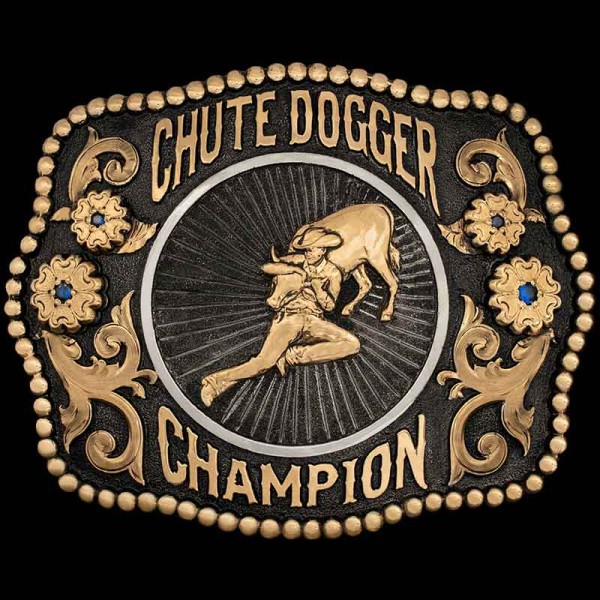The Oatman Belt Buckle is a fantastic trophy buckle perfect for any rodeo event! Crafted on a matted silver base with black enamel and high contrast with golden jeweler's bronze details. Customize it now!